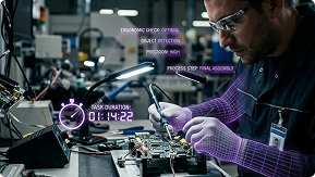 Technician working on electronics with digital overlays
