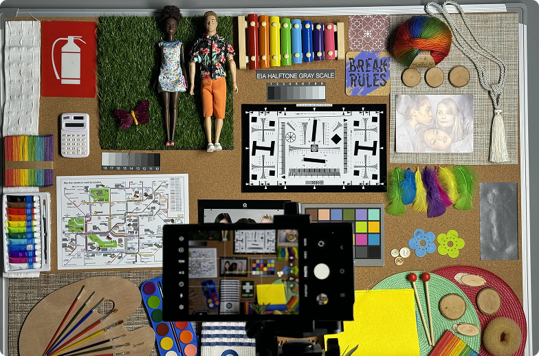 Camera calibration board with color charts and imaging test targets