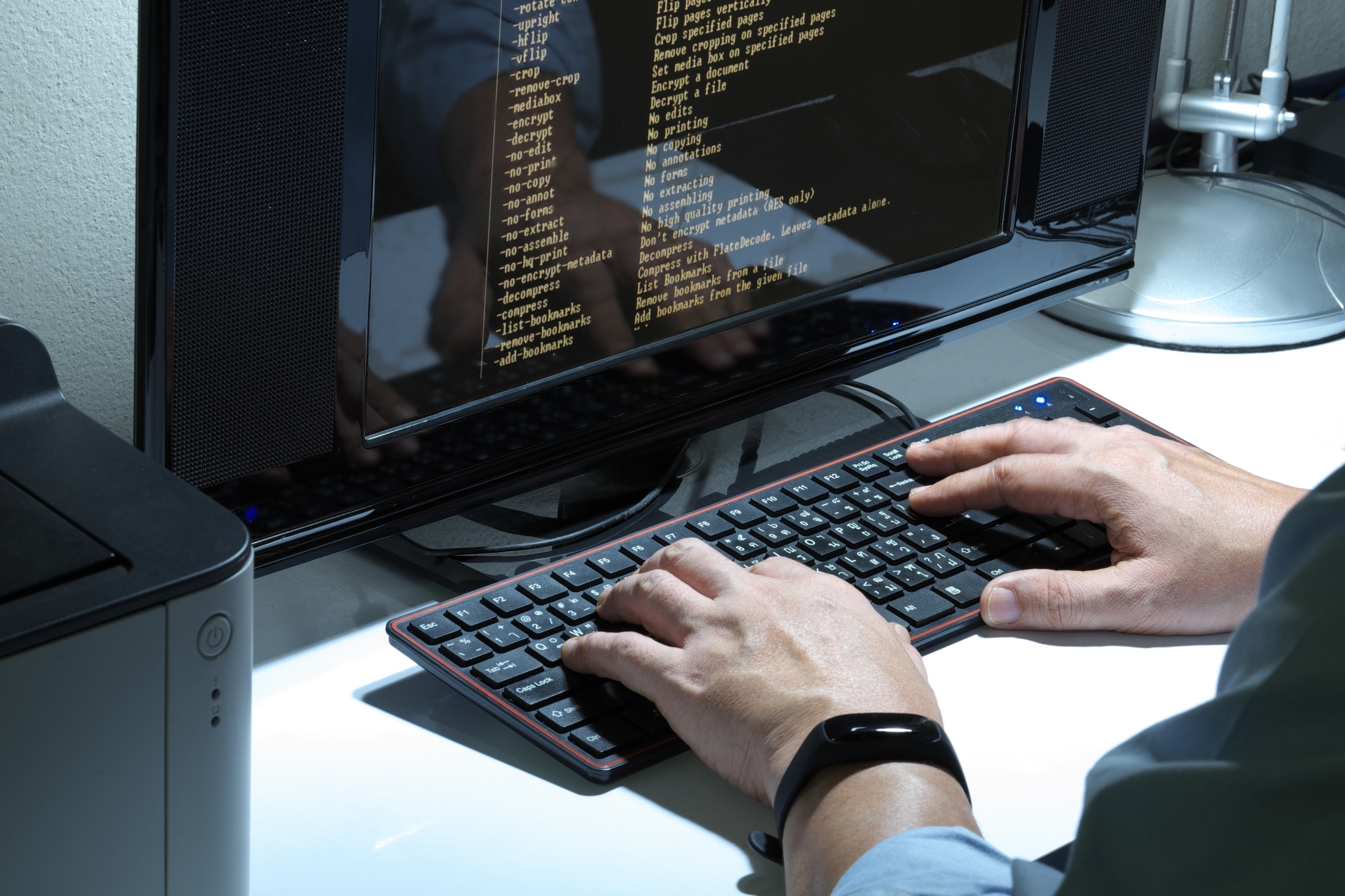 Engineer configuring image quality parameters on a workstation
