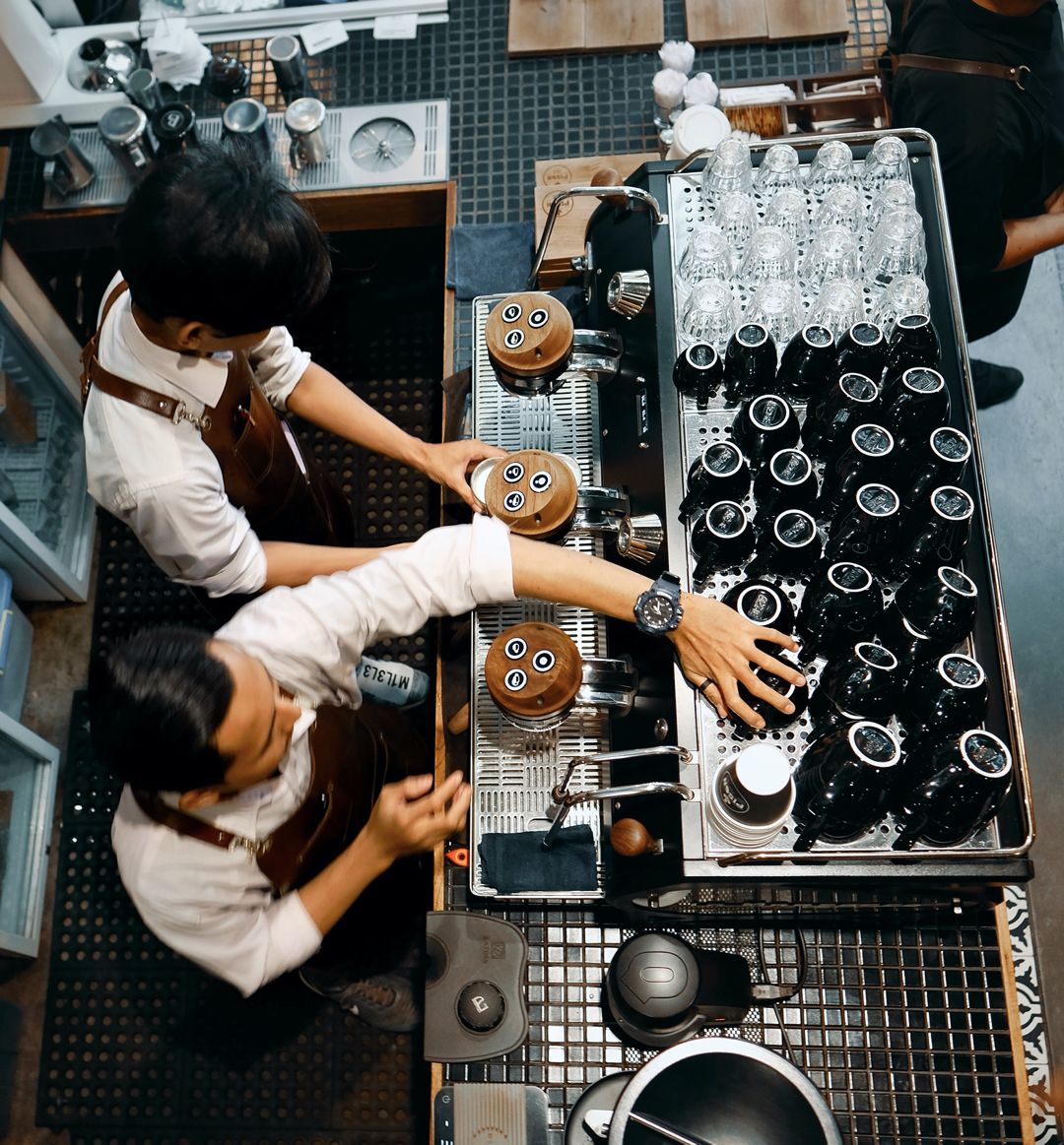 Staff activity behind a busy service counter