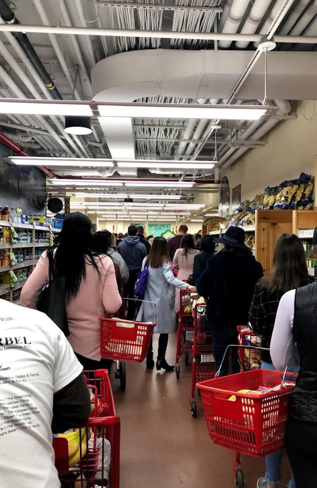 Customers waiting in a retail checkout line